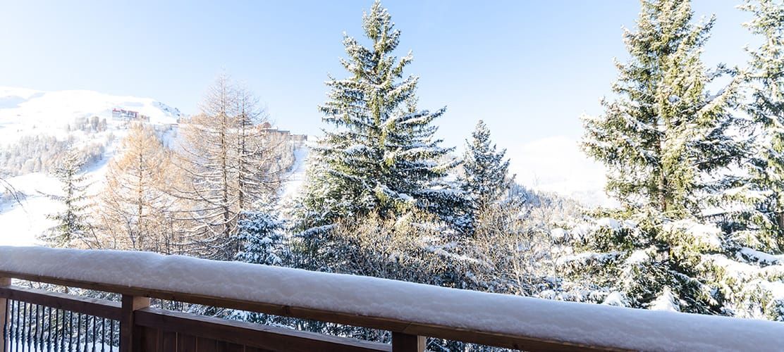 Exterior balcony of chalet Ammonite with views of La Plagne 1800