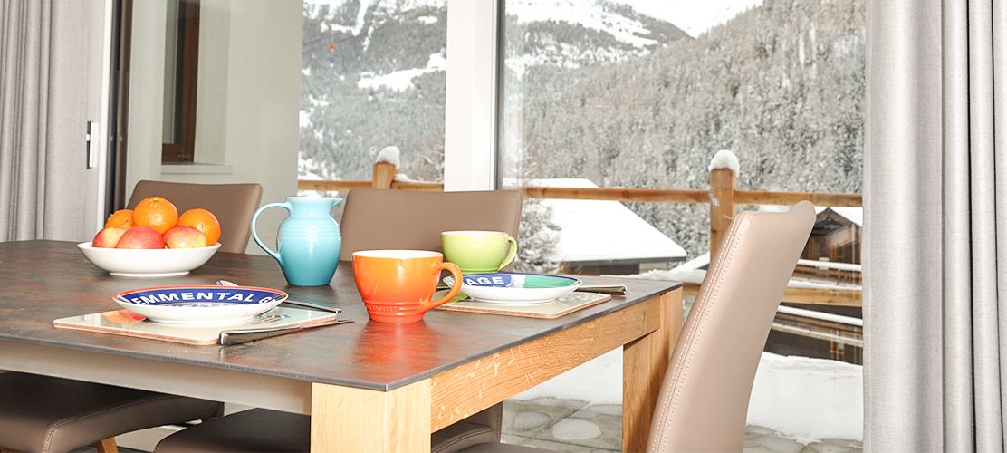 Enjoy breakfast with views over the alpine covered mountains