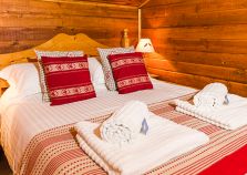 A double bedroom of Chalet Soleil